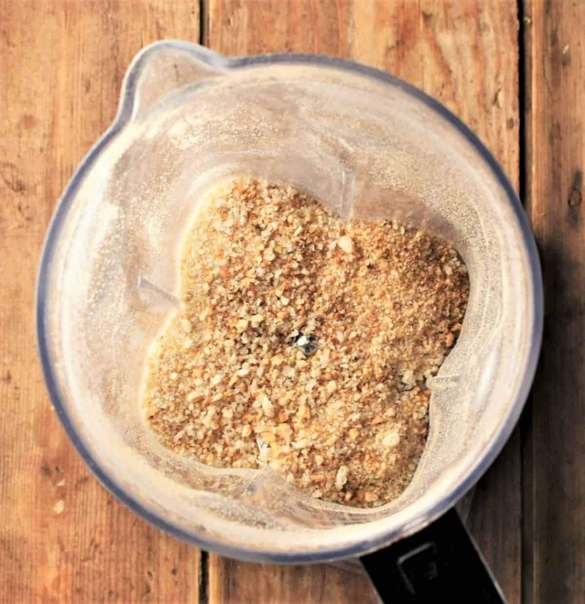 Top down view of breadcrumbs inside blender.