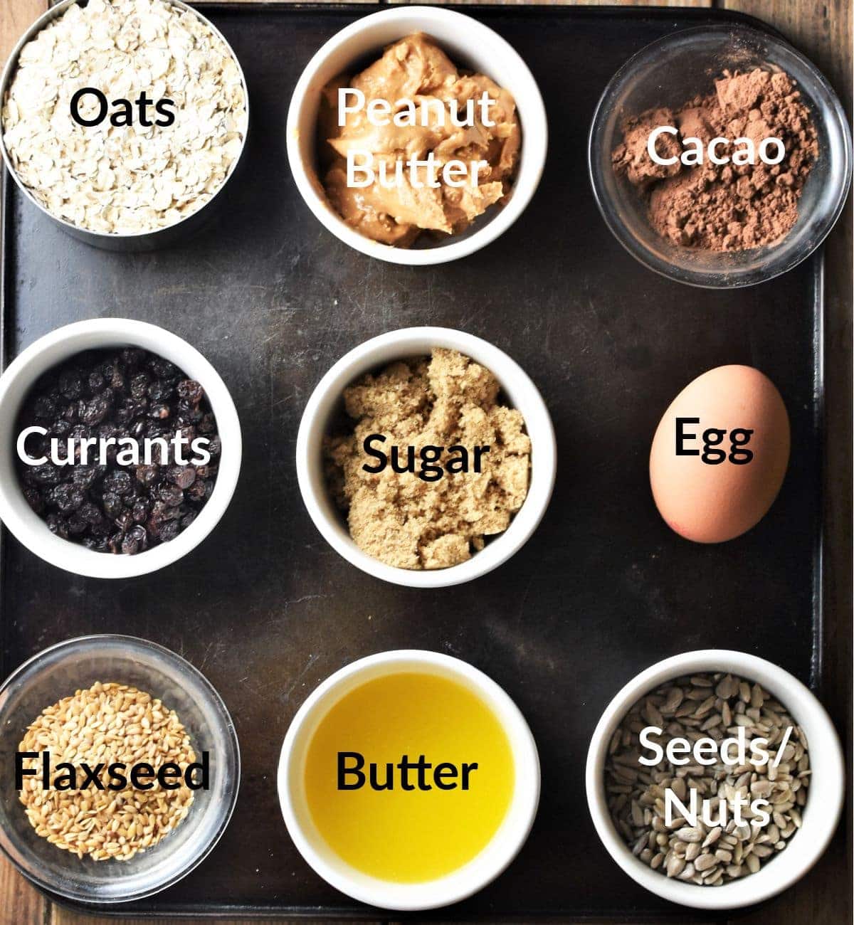Chocolate breakfast cookies ingredients in individual dishes.