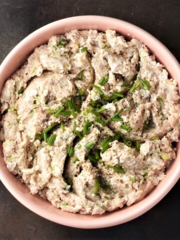 Top down view of smoked mackerel pate in pink bowl.